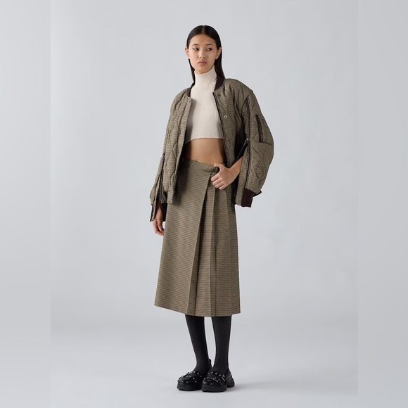 ROKH x GU. 2 Piece Skirt And Pants Set
Checked. - Picture 2 of 13